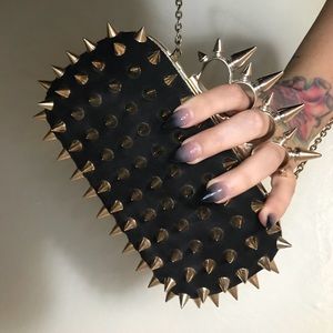 Spiked Brass Knuckles clutch